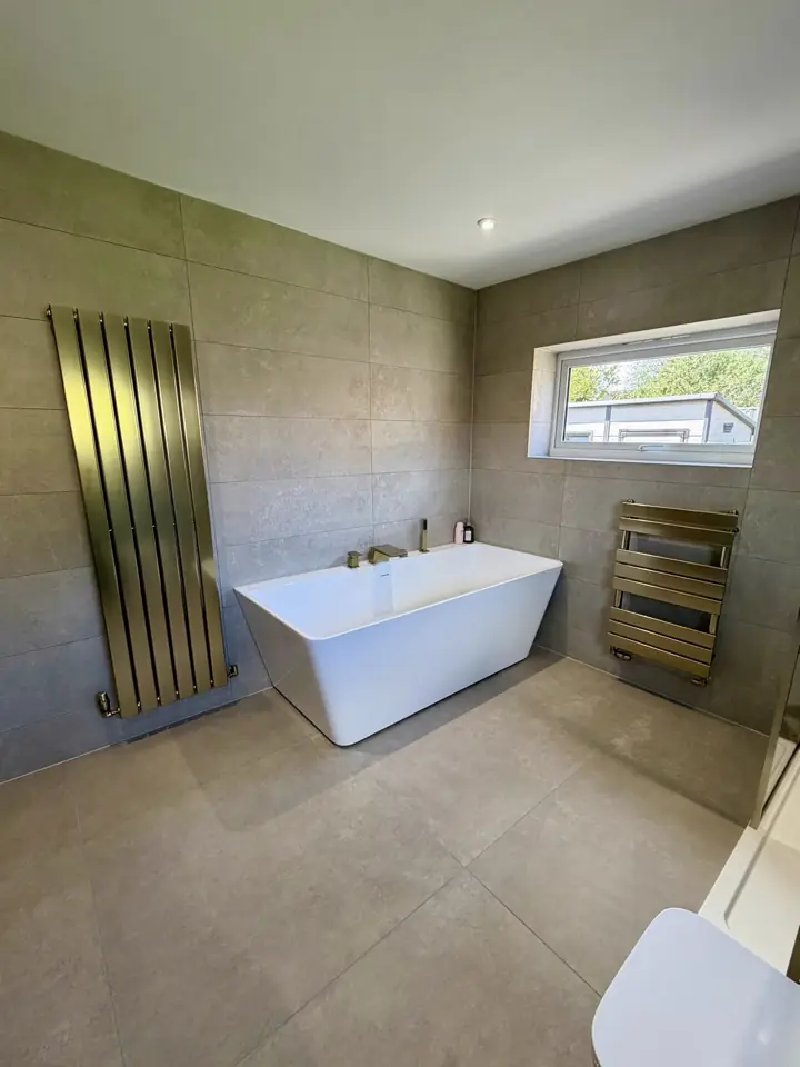 Contemporary bathroom with vanity unit